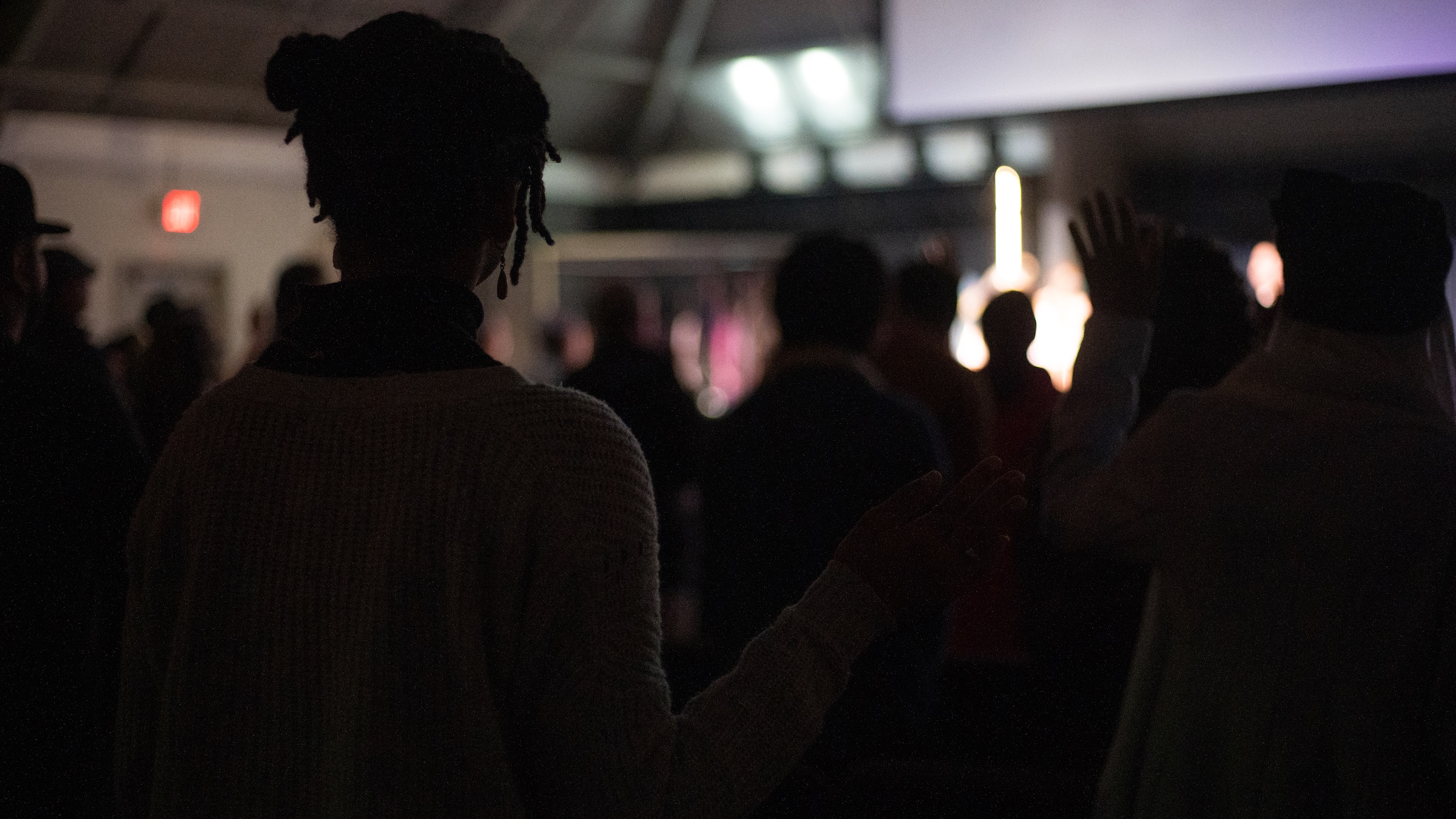 Congregation worshipping at Lineage Church